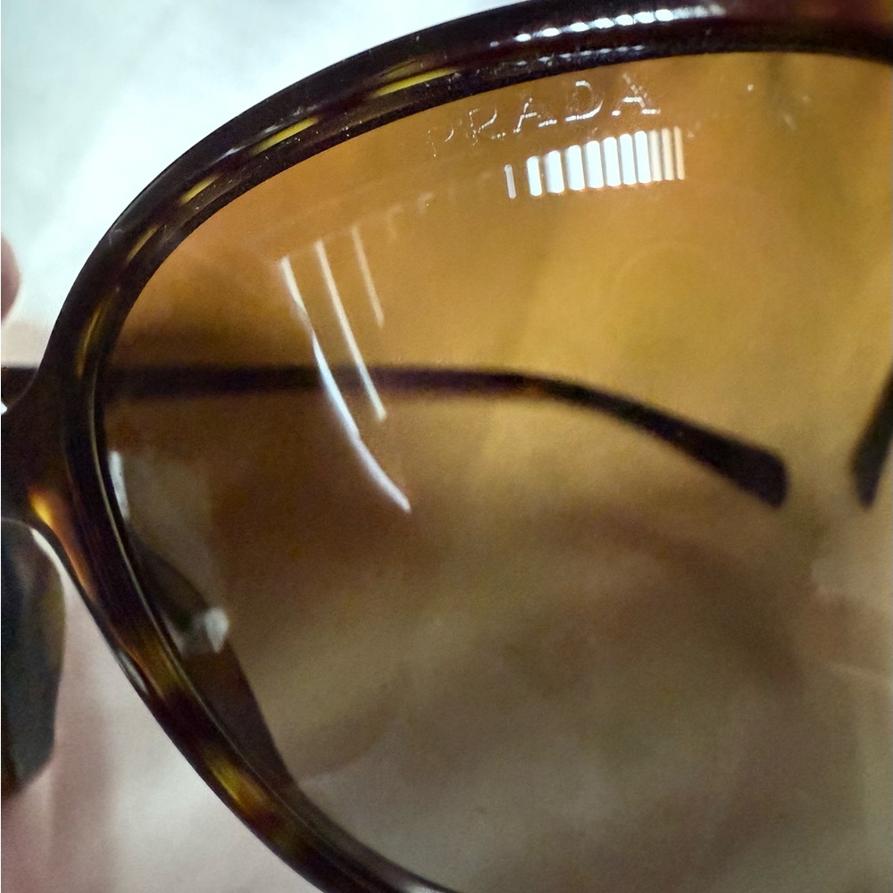 Prada Polarized Women’s Brown and Gold Sunglasses - Picture 12 of 12